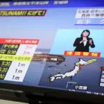 A magnitude 7.5 earthquake shakes northeast Japan and generates a tsunami