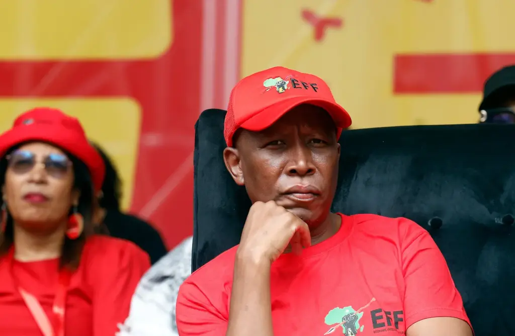 A South African court sentences opposition leader Julius Malema to five years in prison for firing a rifle into the air at a rally