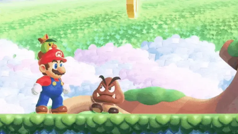 A Goomba bites Mario in Super Mario Wonder