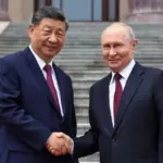 Xi urges Putin to build a “fairer and more equitable” world together five days after Trump's visit