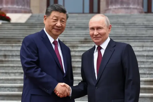 Xi urges Putin to build a “fairer and more equitable” world together five days after Trump's visit
