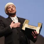 El Festival de Cannes entrega por sorpresa una Palma de Oro de honor a John Travolta: “Es más que un Oscar”