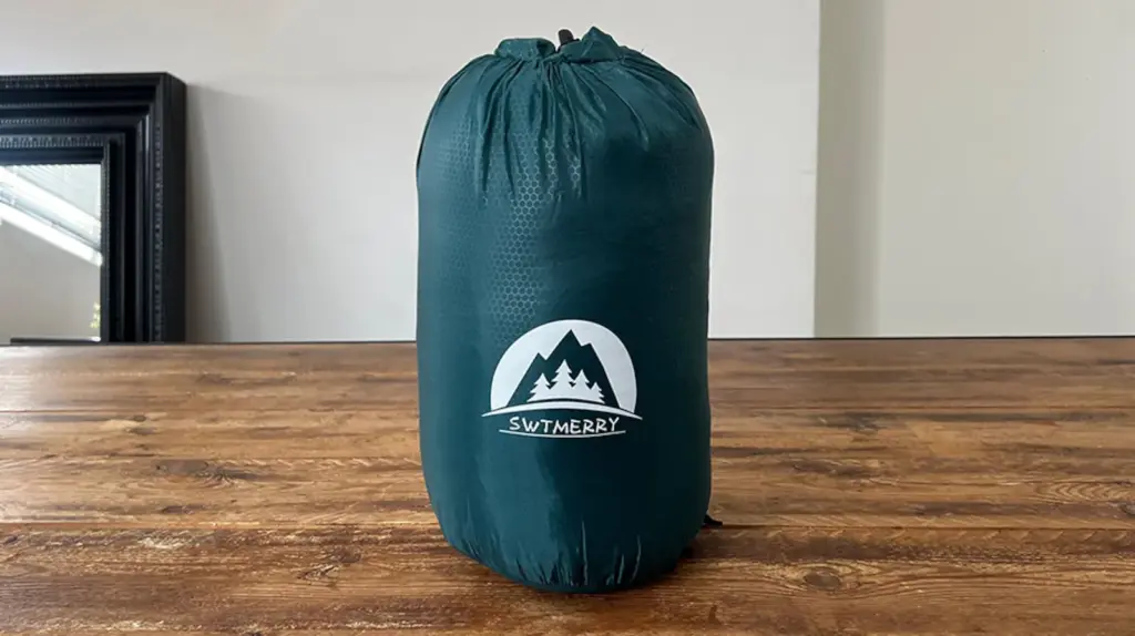 Sleeping bag on a wooden table.