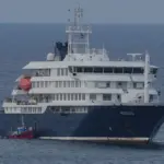 El crucero con los pasajeros confinados por hantavirus va rumbo a Canarias, mientras se pierde el rastro de otros 23