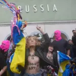 The Pussy Riot and Femen groups protest at the Venice Biennale and try to enter the Russian pavilion