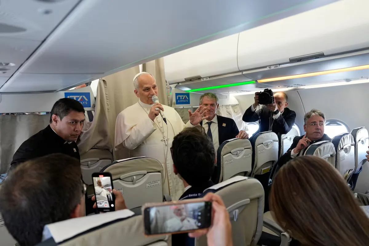 Pope Leo XIV jokes that young people prefer Bad Bunny over him