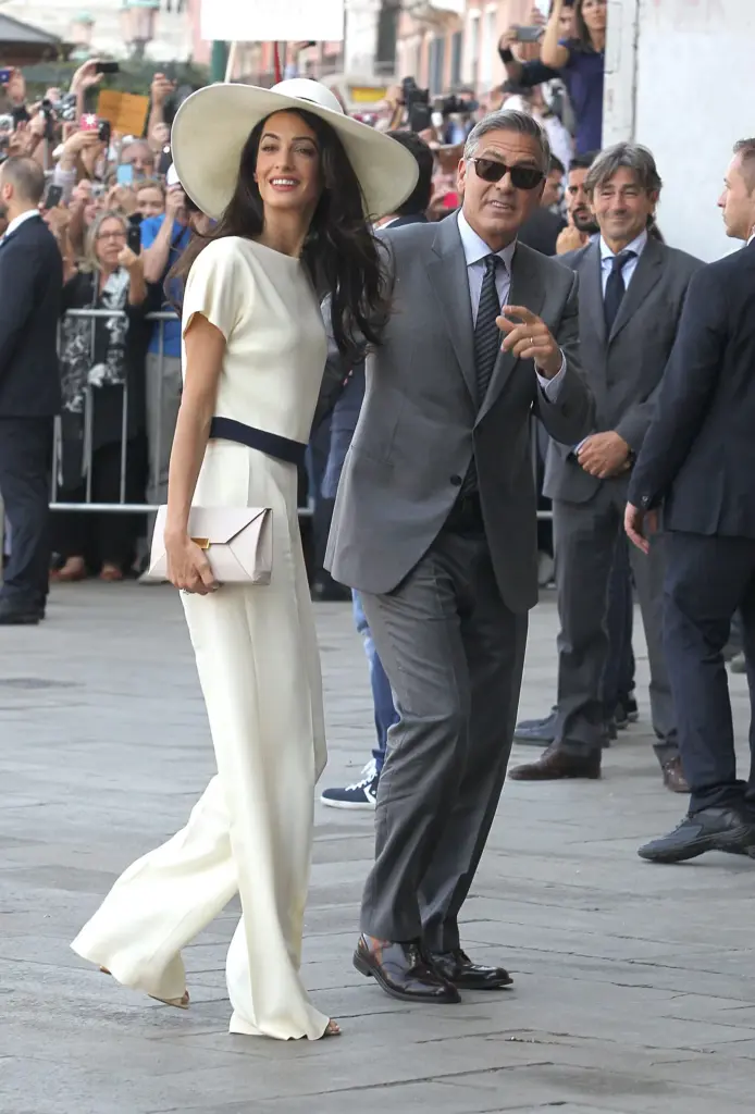 Brides in suits and without princess dresses: why Dua Lipa's choice for her wedding reminds us that classic and executive are bridal options