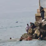 Police and civil guards warn of operational collapse in Ceuta due to the massive entry of migrants swimming: "We are overwhelmed"
