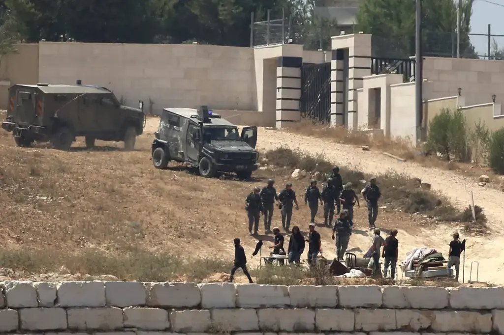 Israel sends troops to a Palestinian village after four days of siege on families by radical settlers