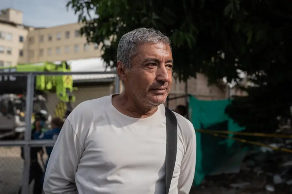 Diego Jaramillo, relative of a patient trapped in the rubble of the Valle University Hospital (HUV), affected by the earthquake in Colombia, in Cali, on August 14, 2026.