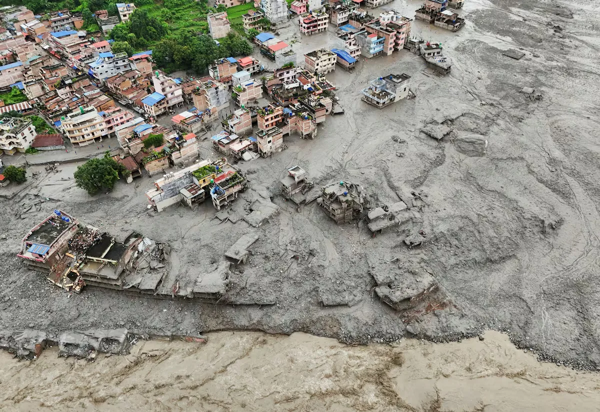 The number of missing in Nepal and Tibet after the strong flood exceeds 1,300, with at least 180 dead