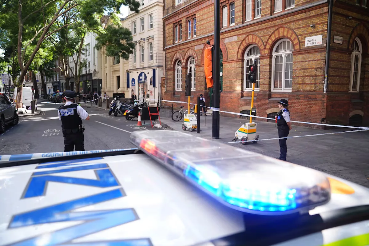 London police arrest a woman accused of stabbing four people