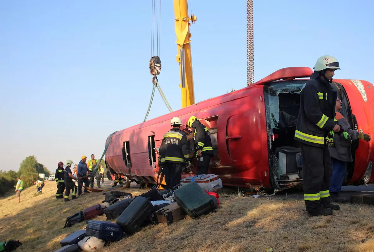 At least 12 dead as a Polish tourist bus overturns on a highway in Hungary