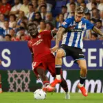 Espanyol rescues a heart-stopping point against a Sevilla that held on with one less player