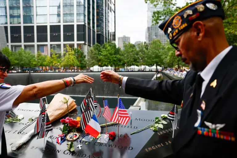 Trump's absence marks the 25th anniversary of 9/11 in New York, presided over by the remembrance of the victims