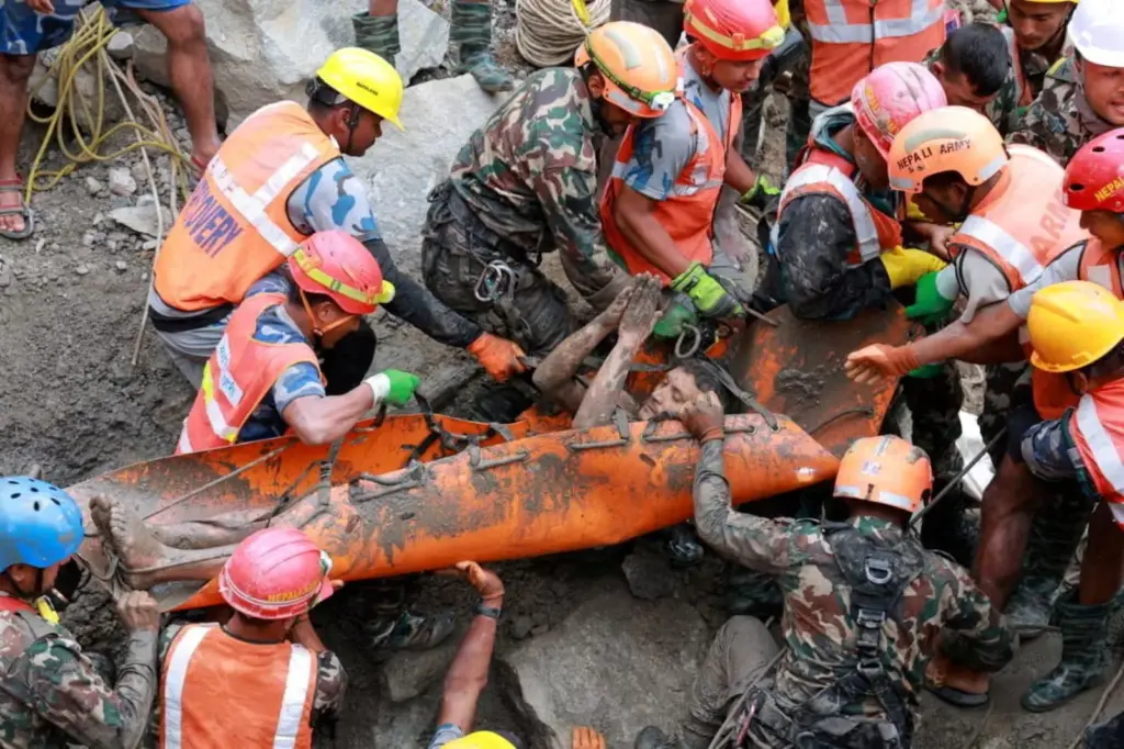 Nepal rescues two workers alive from a hydroelectric plant tunnel nine days after the flood