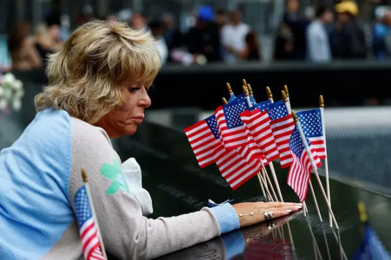 Trump's absence marks the 25th anniversary of 9/11 in New York, presided over by the remembrance of the victims