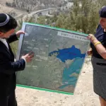 Israel will authorize more than 2,000 new homes in the controversial settlement that divides the West Bank in two