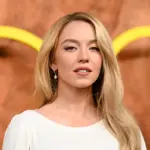 Sydney Sweeney responds to criticism for posing nude in a sports betting ad with the nudity of well-known athletes