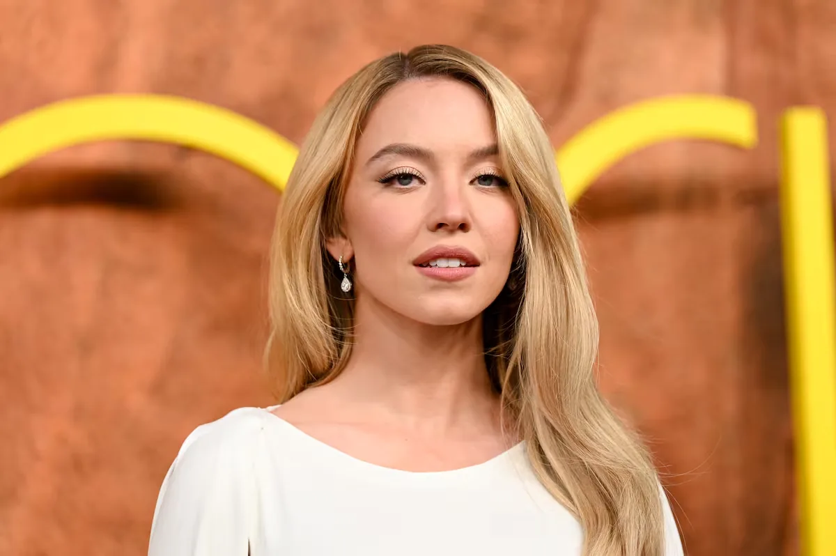 Sydney Sweeney responds to criticism for posing nude in a sports betting ad with the nudity of well-known athletes