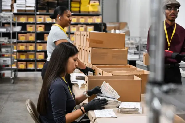 A whistleblower warns that a new Postal Service system could leave millions of voters unable to vote