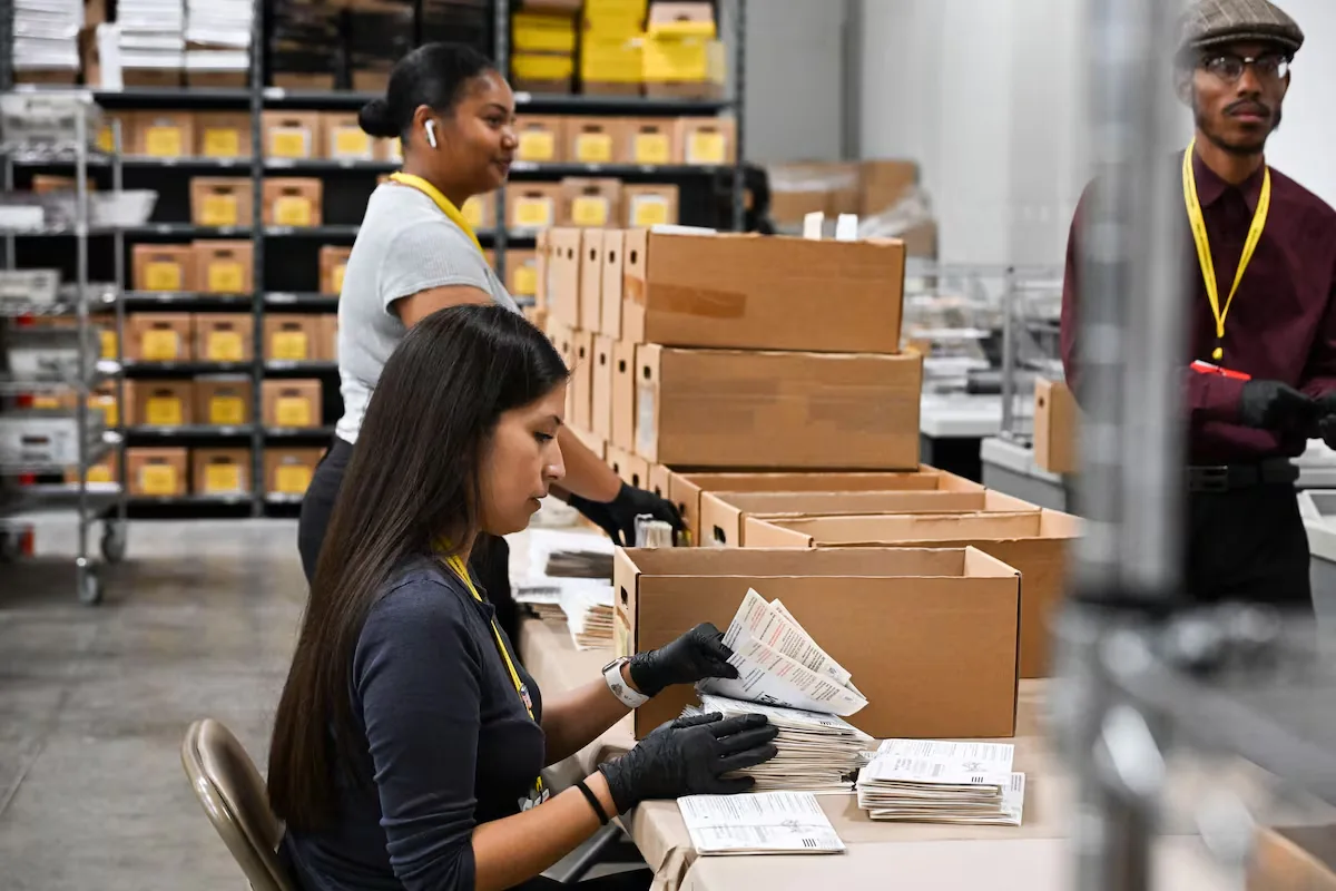 A whistleblower warns that a new Postal Service system could leave millions of voters unable to vote