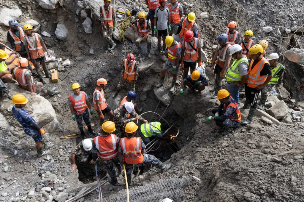 Nepal rescues two workers alive from a hydroelectric plant tunnel nine days after the flood