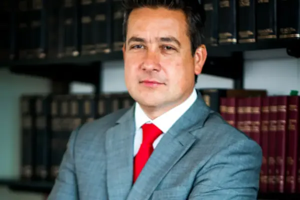 Chilean former prosecutor Vinko Fodich and three police officers arrested in an investigation for extortion kidnappings